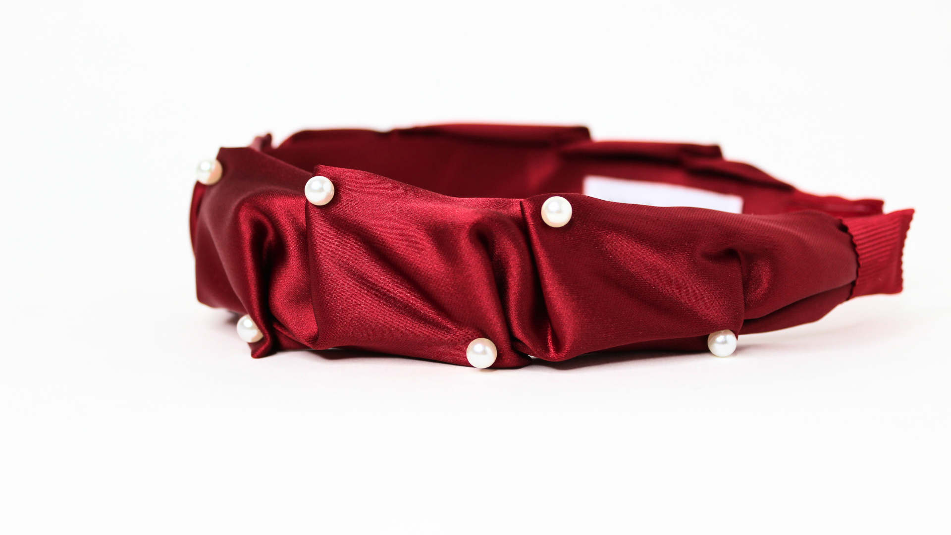 Aria pearl ruched headband in ruby red satin